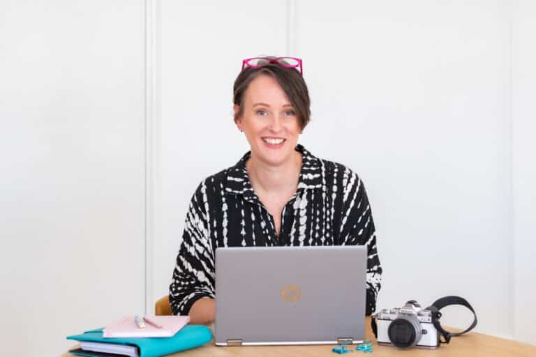 Alicia Montesano at desk with laptop